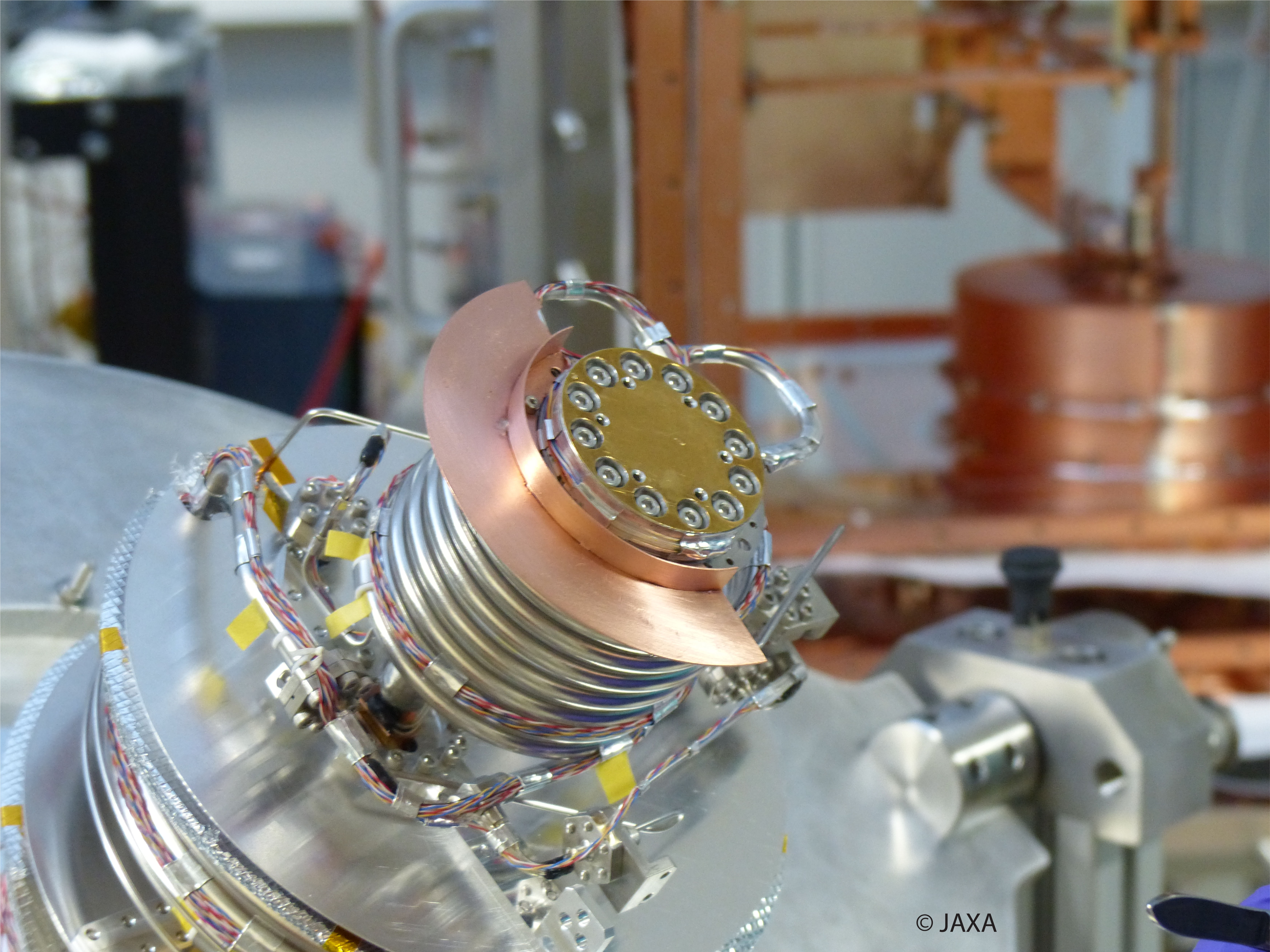 A cold tip of JAXA 2K Joule-Thomson cooler at the top of the heat exchanger tubing